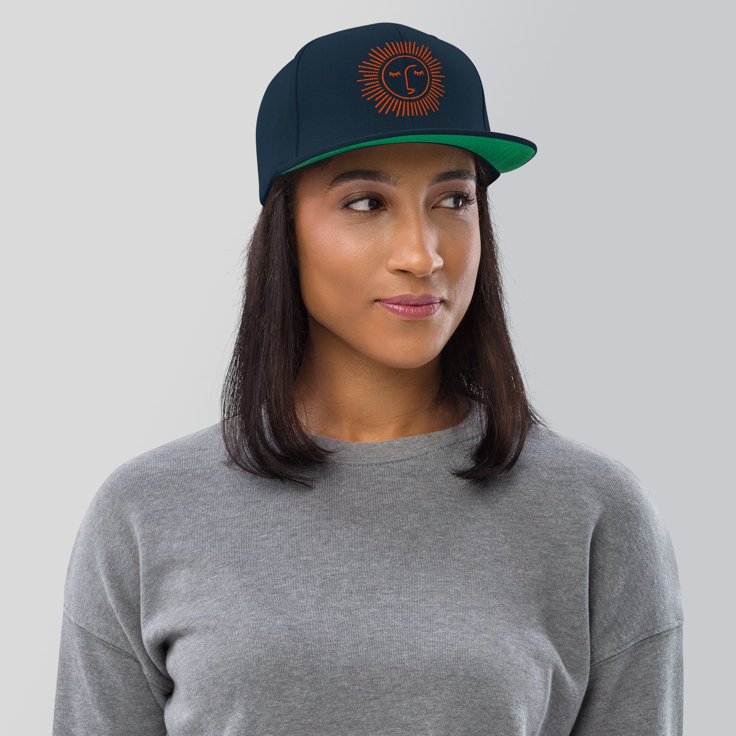 casquette base ball avec différents coloris et logo orange brodé