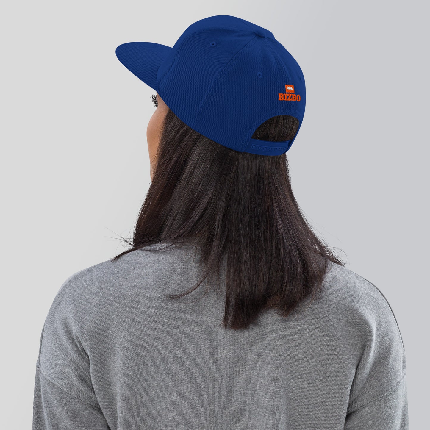 casquette base ball avec différents coloris et logo orange brodé