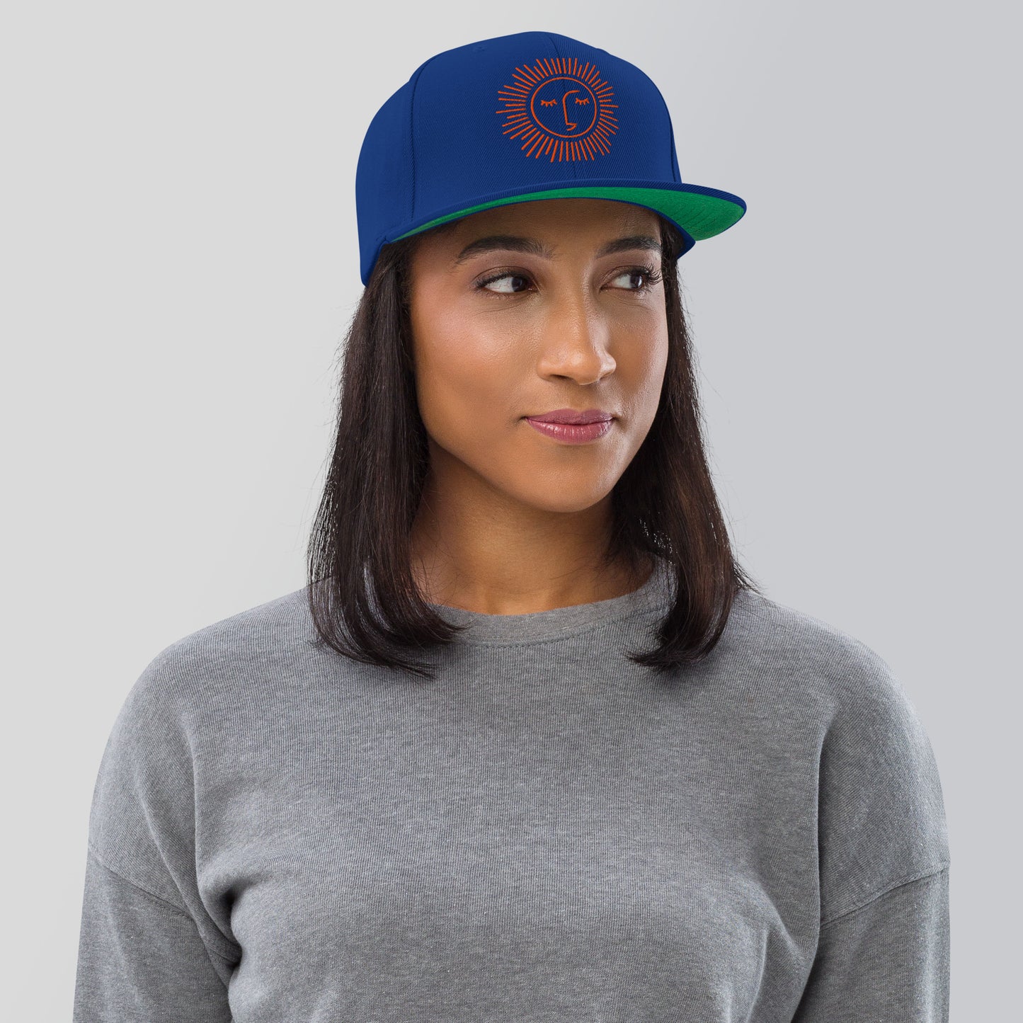 casquette base ball avec différents coloris et logo orange brodé