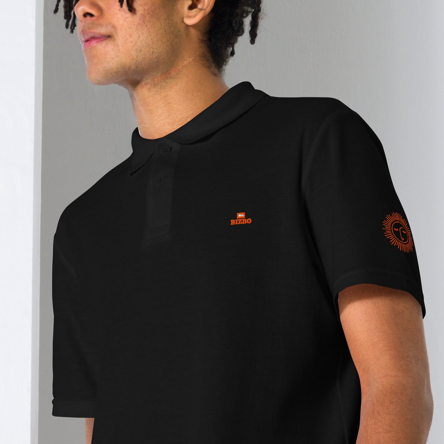 polo unisexe avec logo orange 100% coton