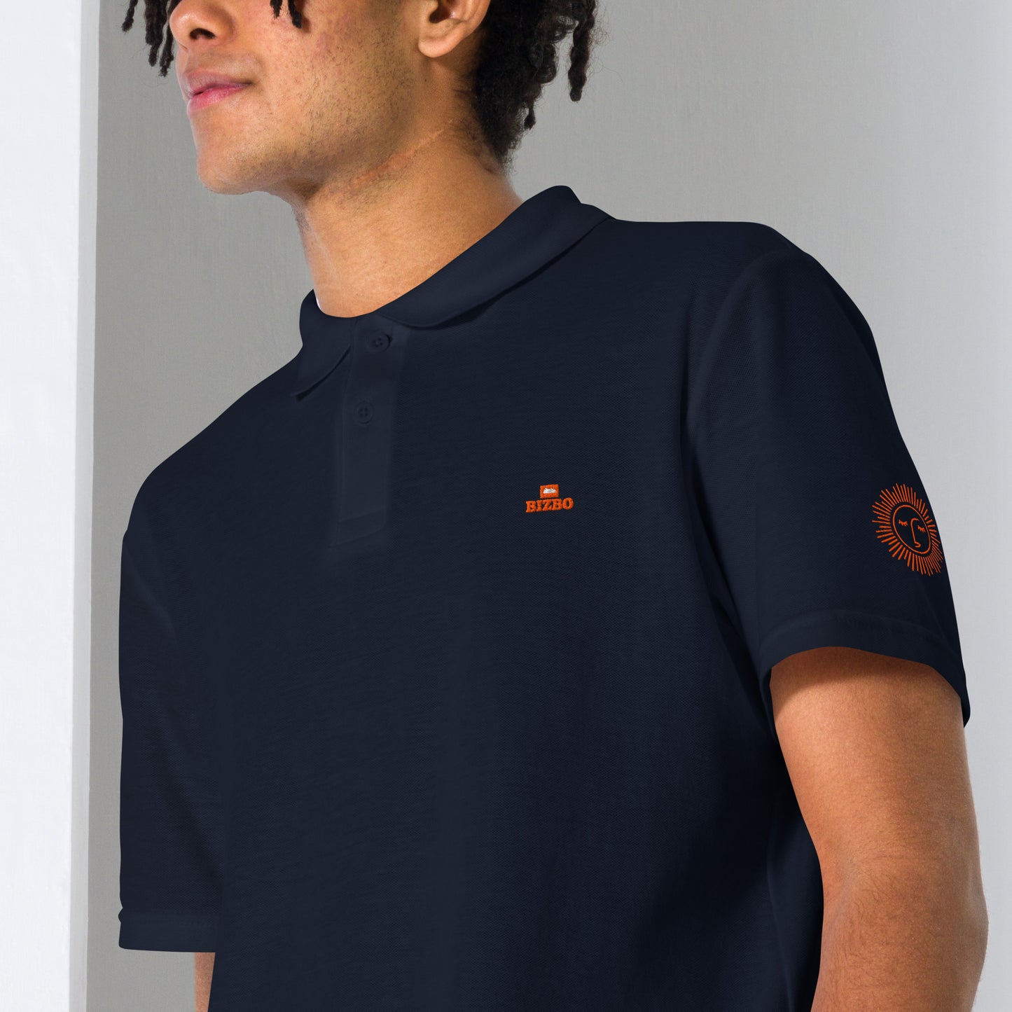 polo unisexe avec logo orange 100% coton