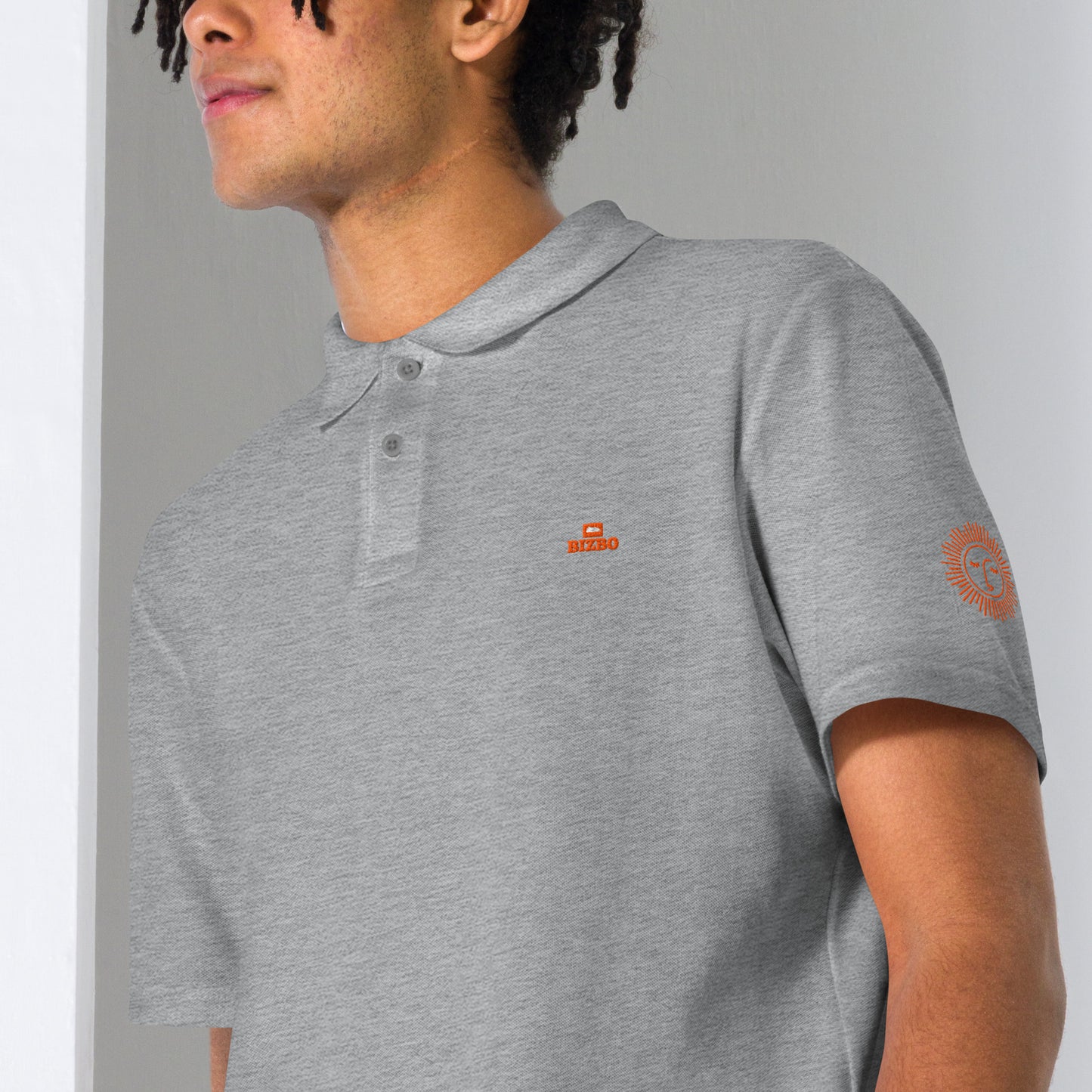 polo unisexe avec logo orange 100% coton